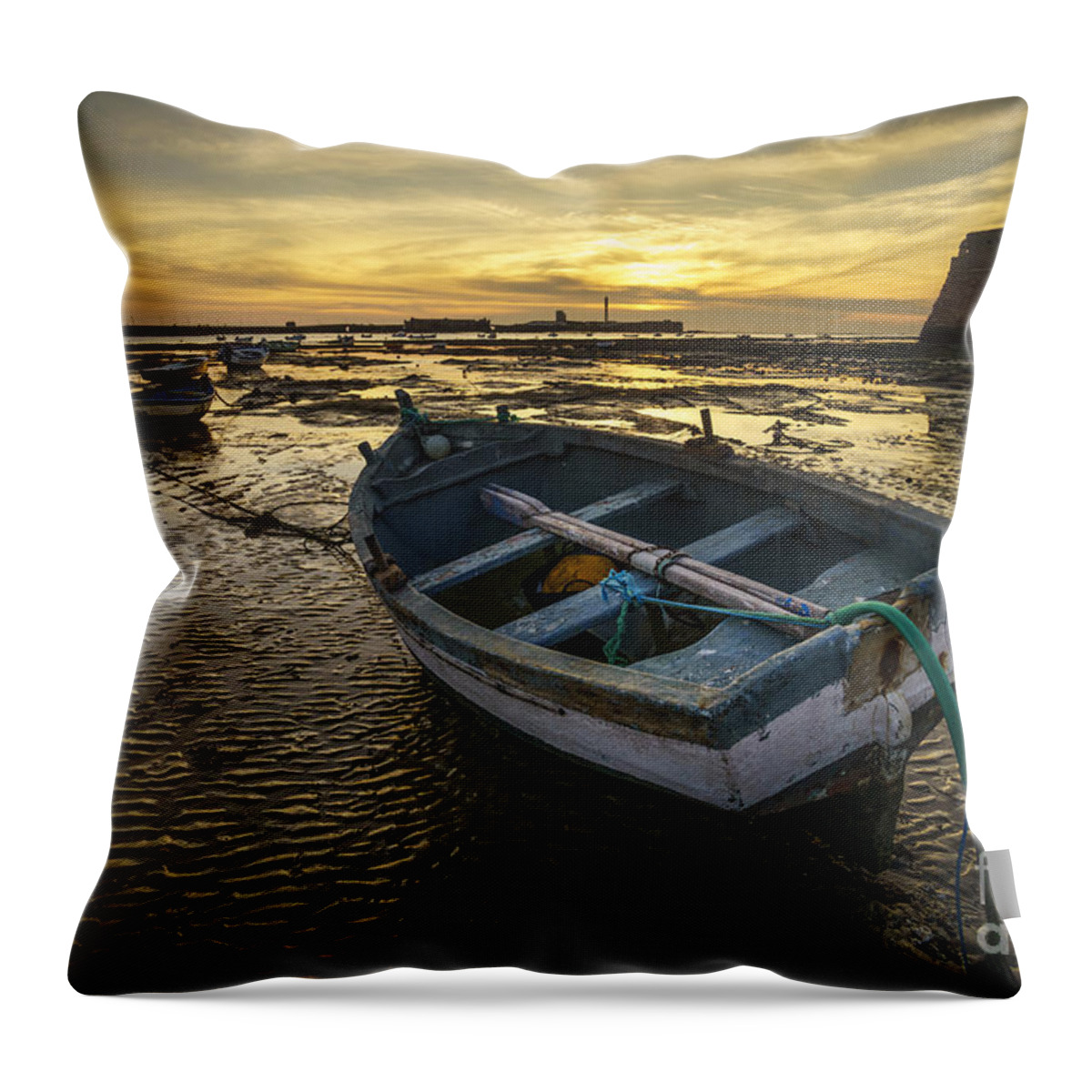12mm F2 Throw Pillow featuring the photograph Beached Boat on La Caleta Cadiz Spain by Pablo Avanzini