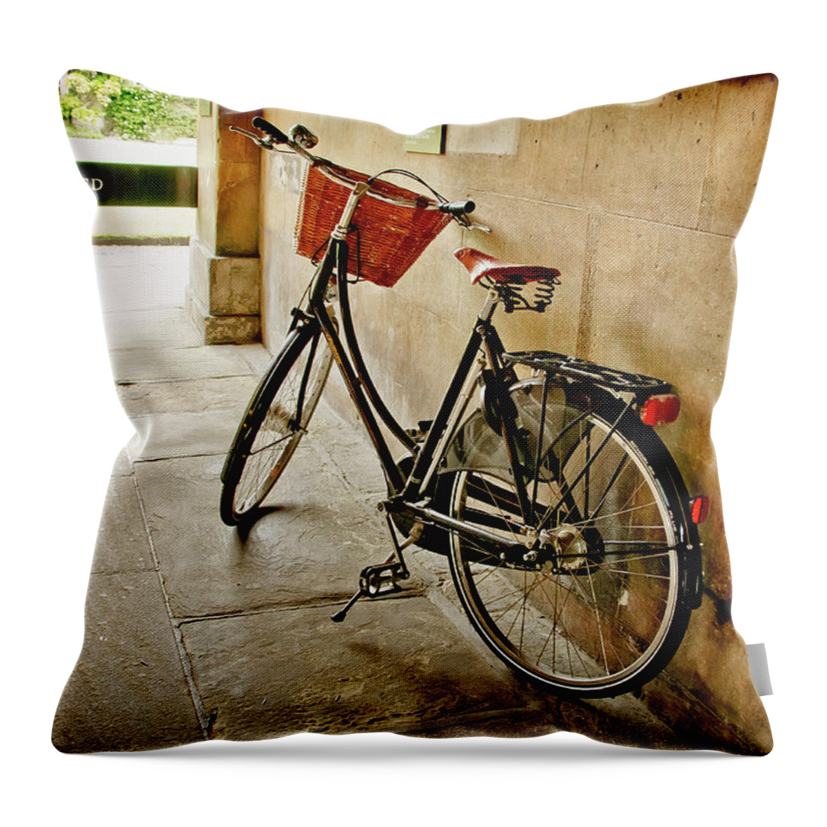 Christ's College Throw Pillow featuring the photograph Bike at the school gate. by Elena Perelman