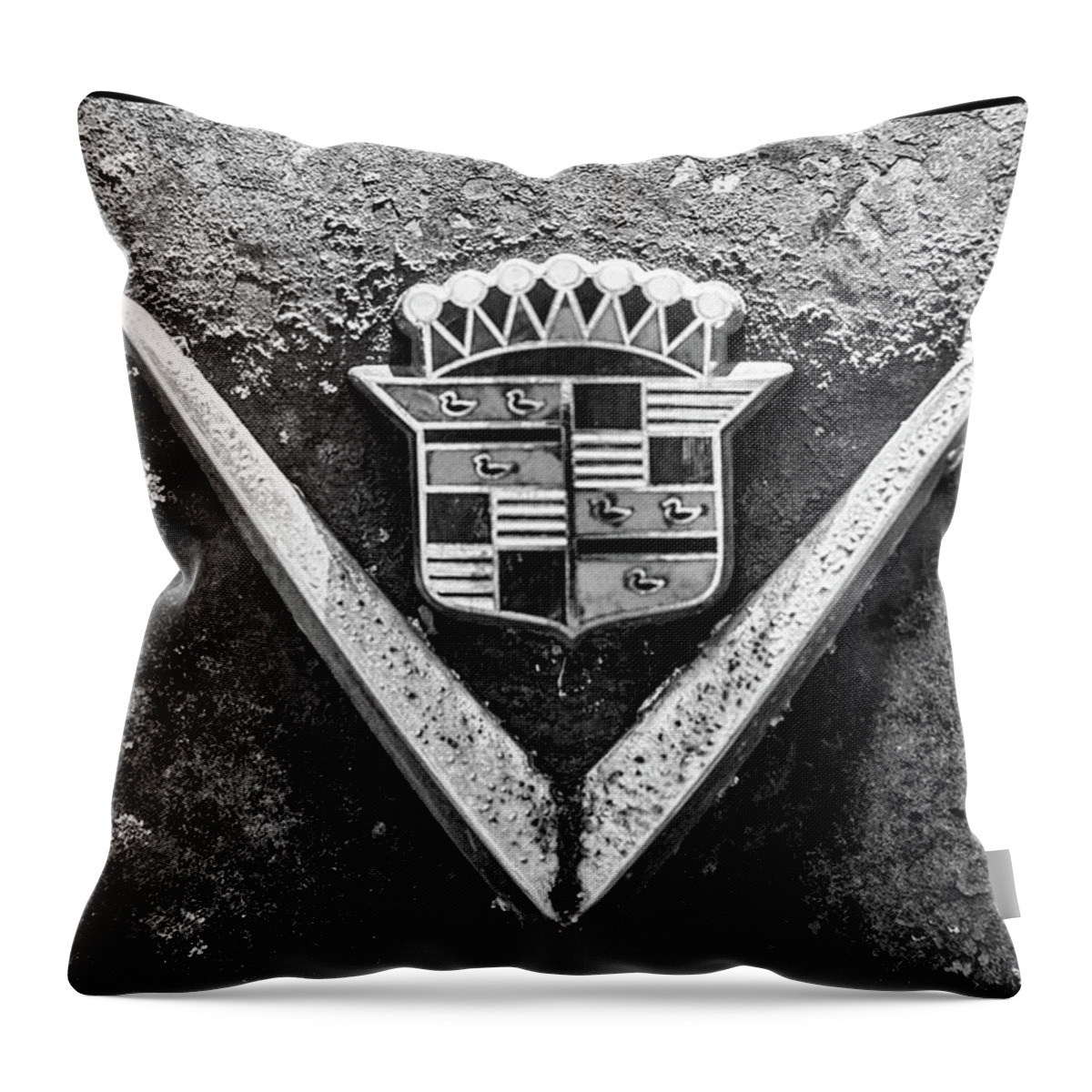 Rusted Throw Pillow featuring the photograph Cadillac Emblem by Matthew Pace