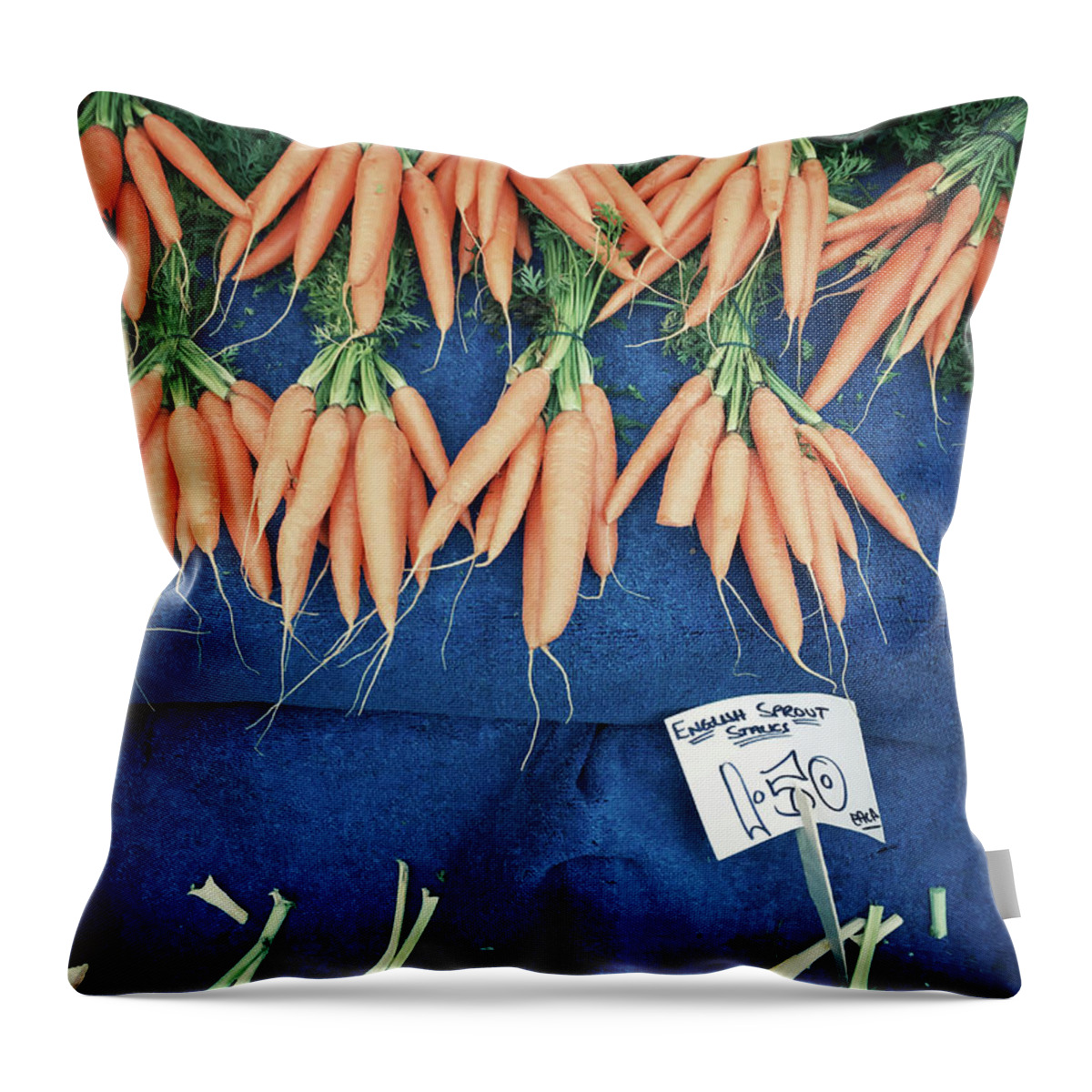 Agriculture Throw Pillow featuring the photograph Carrots at the market by Tom Gowanlock