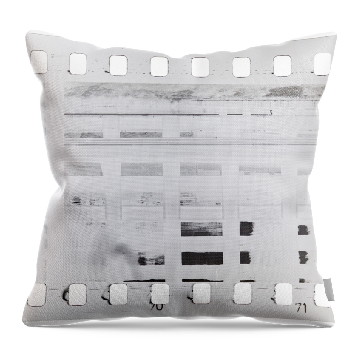 Film Throw Pillow featuring the photograph Celluloid film by Michal Boubin