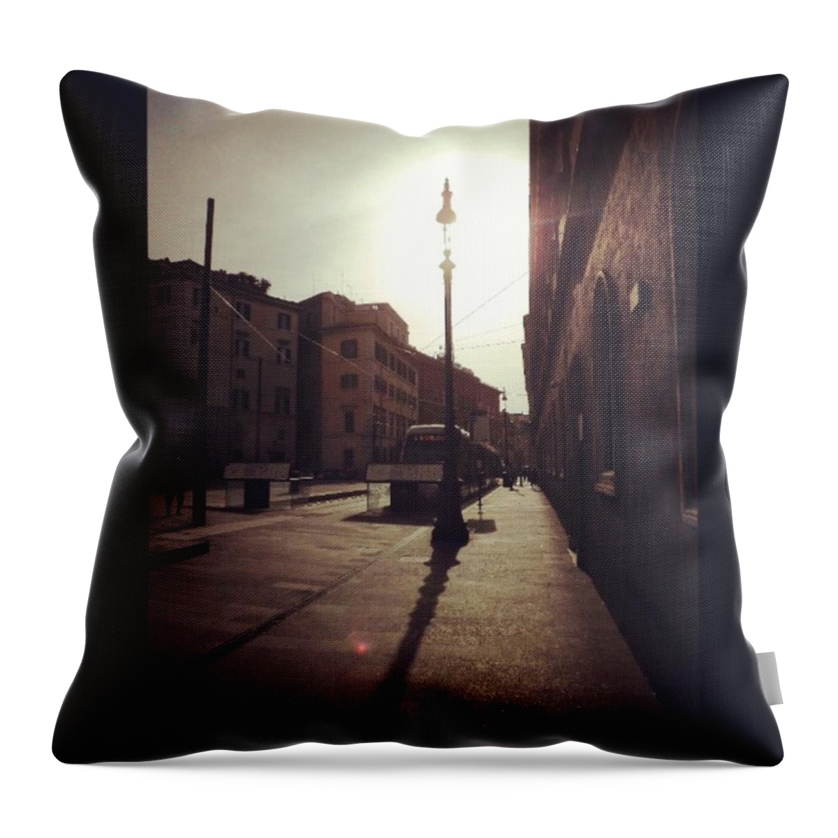 Brown Throw Pillow featuring the photograph #centrodiroma #mezzipubblici #light by Lorin Braticevici