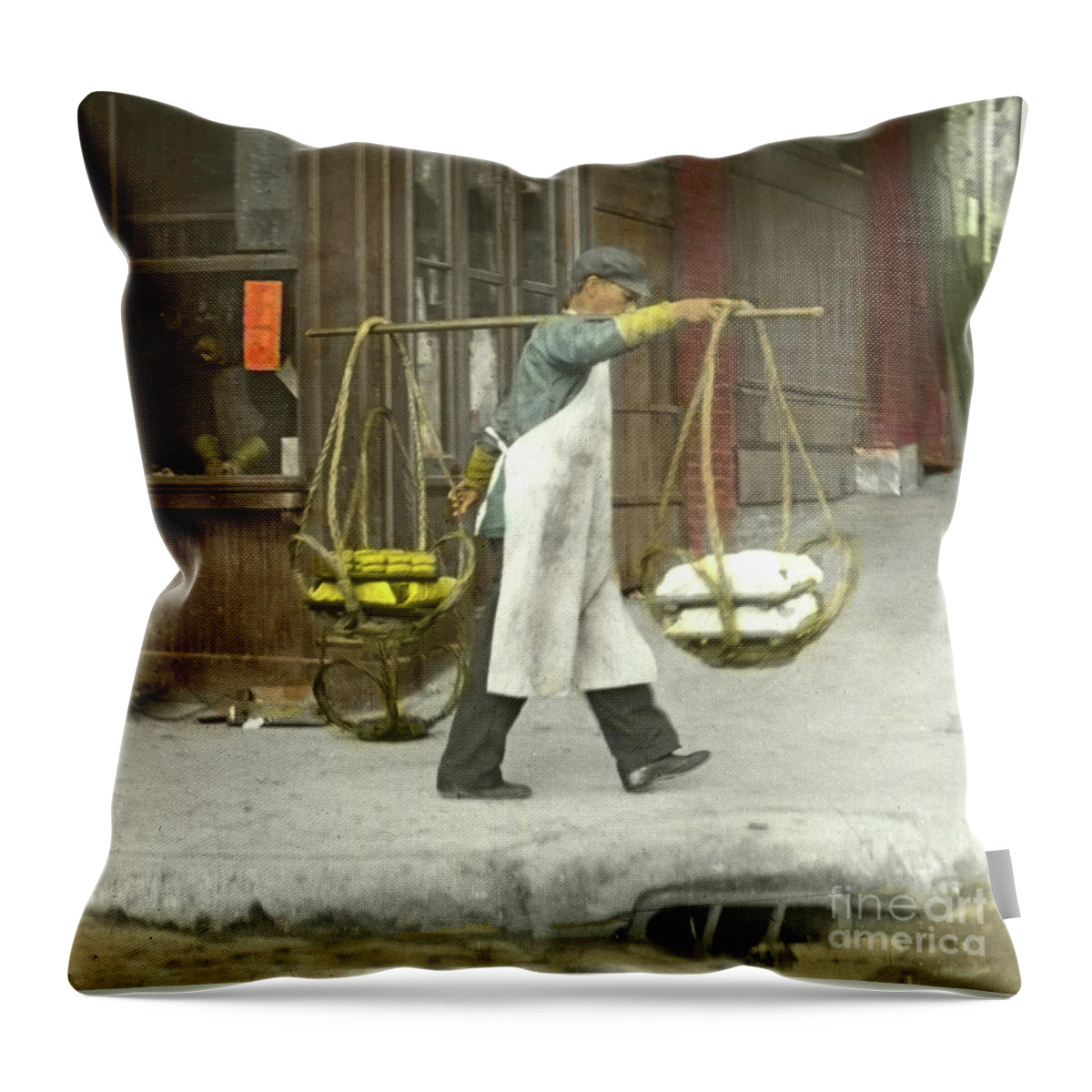 Chinese Man Throw Pillow featuring the photograph Chinese man carrying produce in baskets balanced on pole over shoulder by Monterey County Historical Society