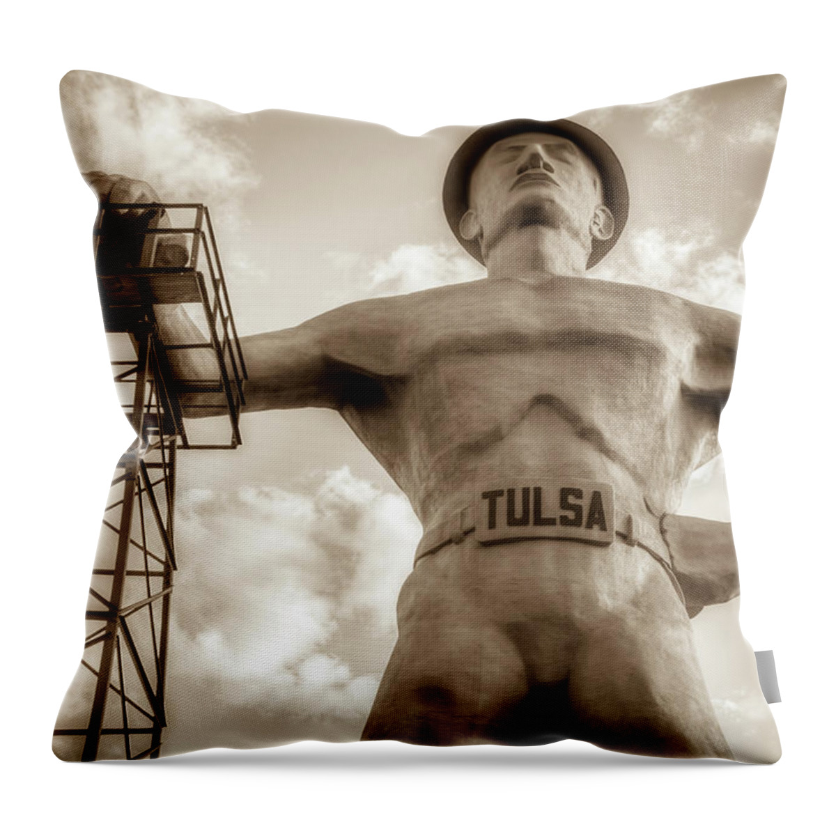 American Throw Pillow featuring the photograph Close Up of Tulsa Driller Statue - Sepia by Gregory Ballos