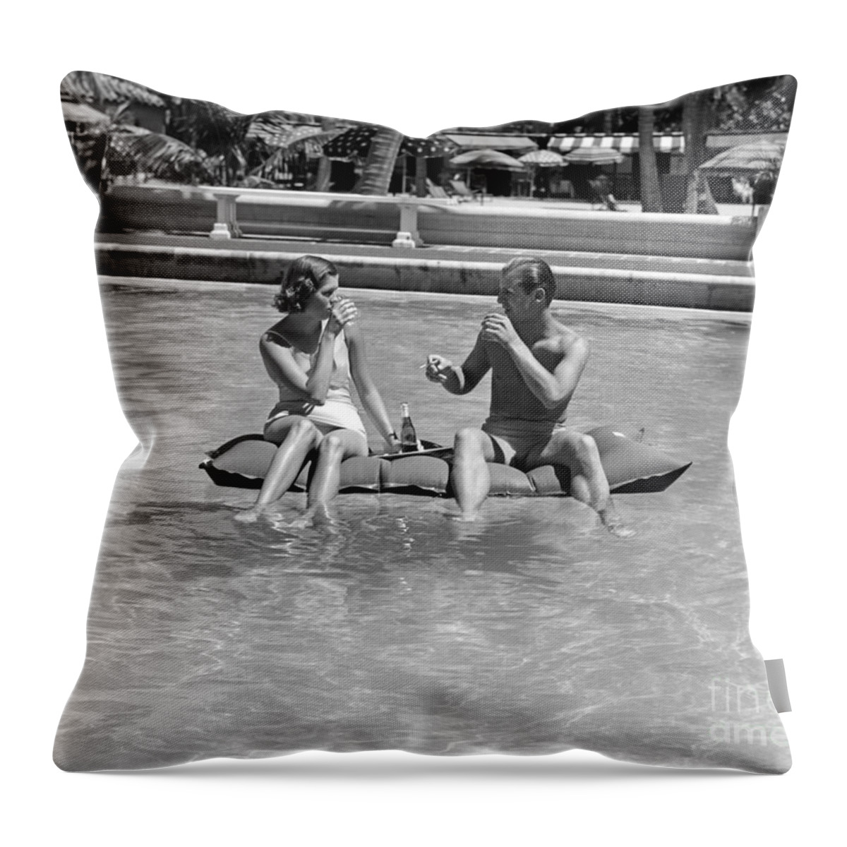 1930s Throw Pillow featuring the photograph Couple Relaxing In Pool, C.1930-40s by H Armstrong Roberts and ClassicStock