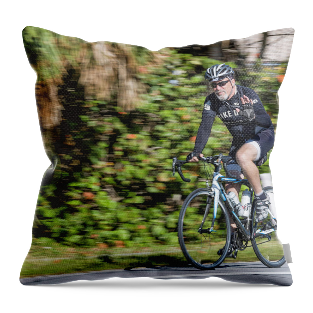 Cyclist Throw Pillow featuring the photograph Cyclist on Hutchinson Island by Fran Gallogly