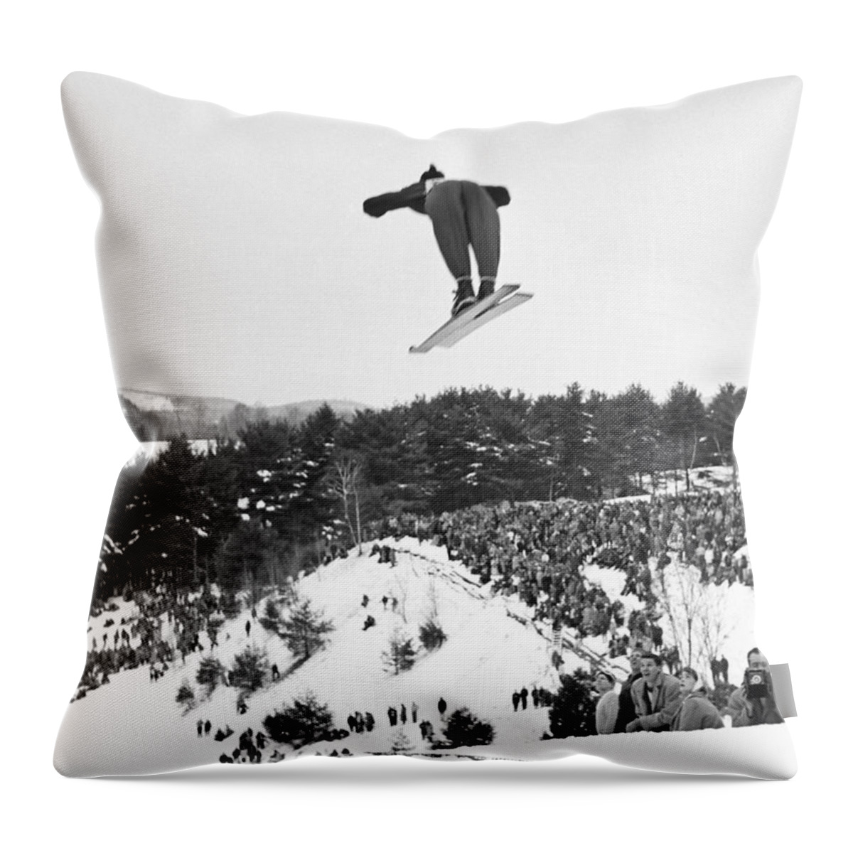 1950's Throw Pillow featuring the photograph Dartmouth Carnival Ski Jumper by Underwood Archives