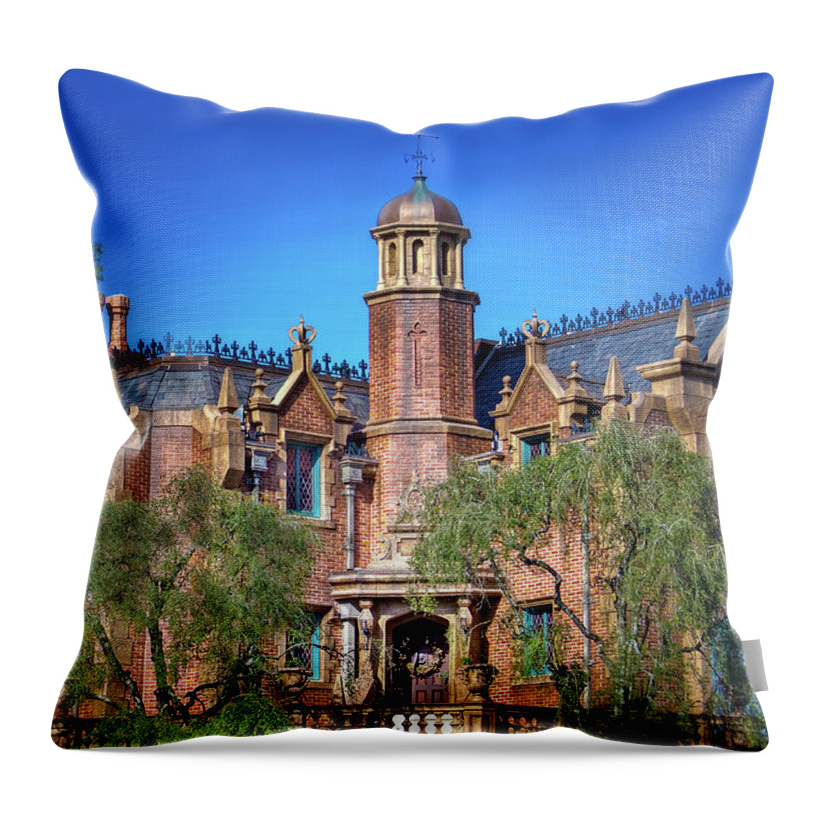 Magic Kingdom Throw Pillow featuring the photograph Disney World Haunted Mansion by Mark Andrew Thomas