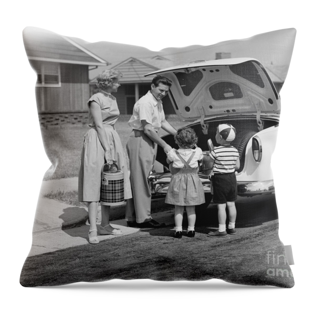 1950s Throw Pillow featuring the photograph Family Setting Out For A Picnic, C.1950s by H. Armstrong Roberts/ClassicStock