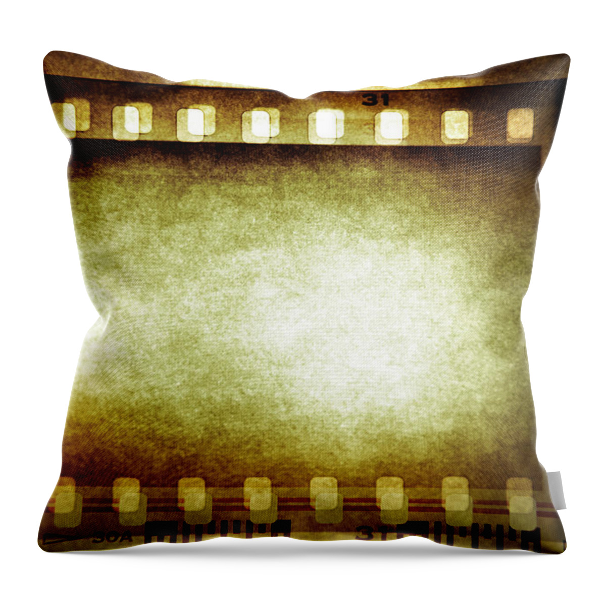Film Throw Pillow featuring the photograph Filmstrip by Les Cunliffe