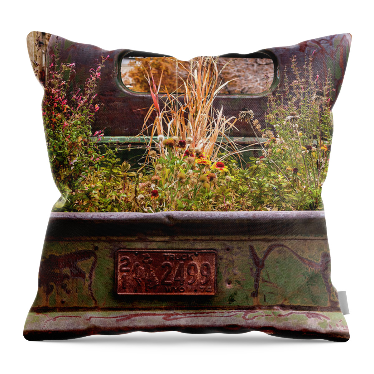 Abstracts Throw Pillow featuring the photograph Flower Bed - Nature and Machine by Steven Milner