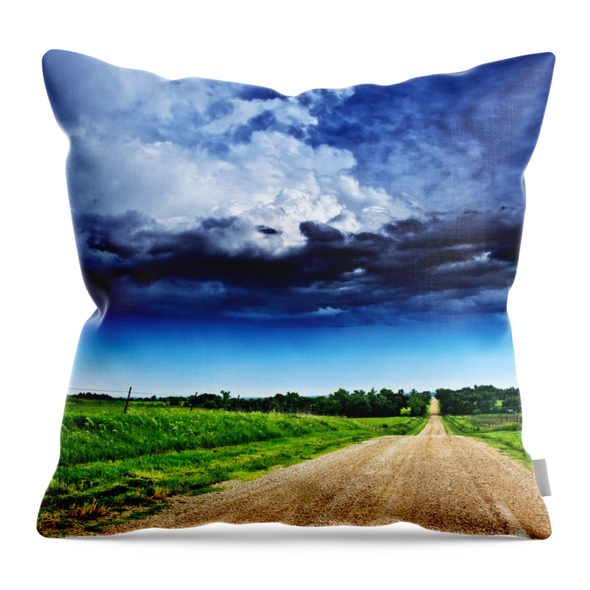 Road Throw Pillow featuring the photograph Forming Clouds over Gravel by Eric Benjamin