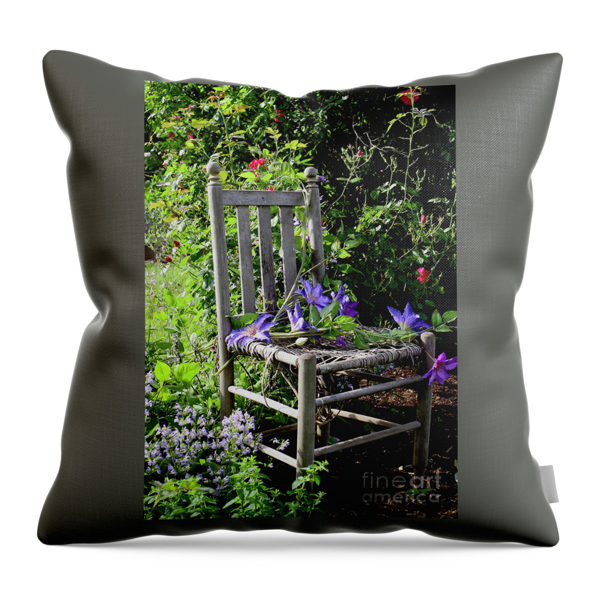 Garden Throw Pillow featuring the photograph Garden Chair by Paula Guttilla
