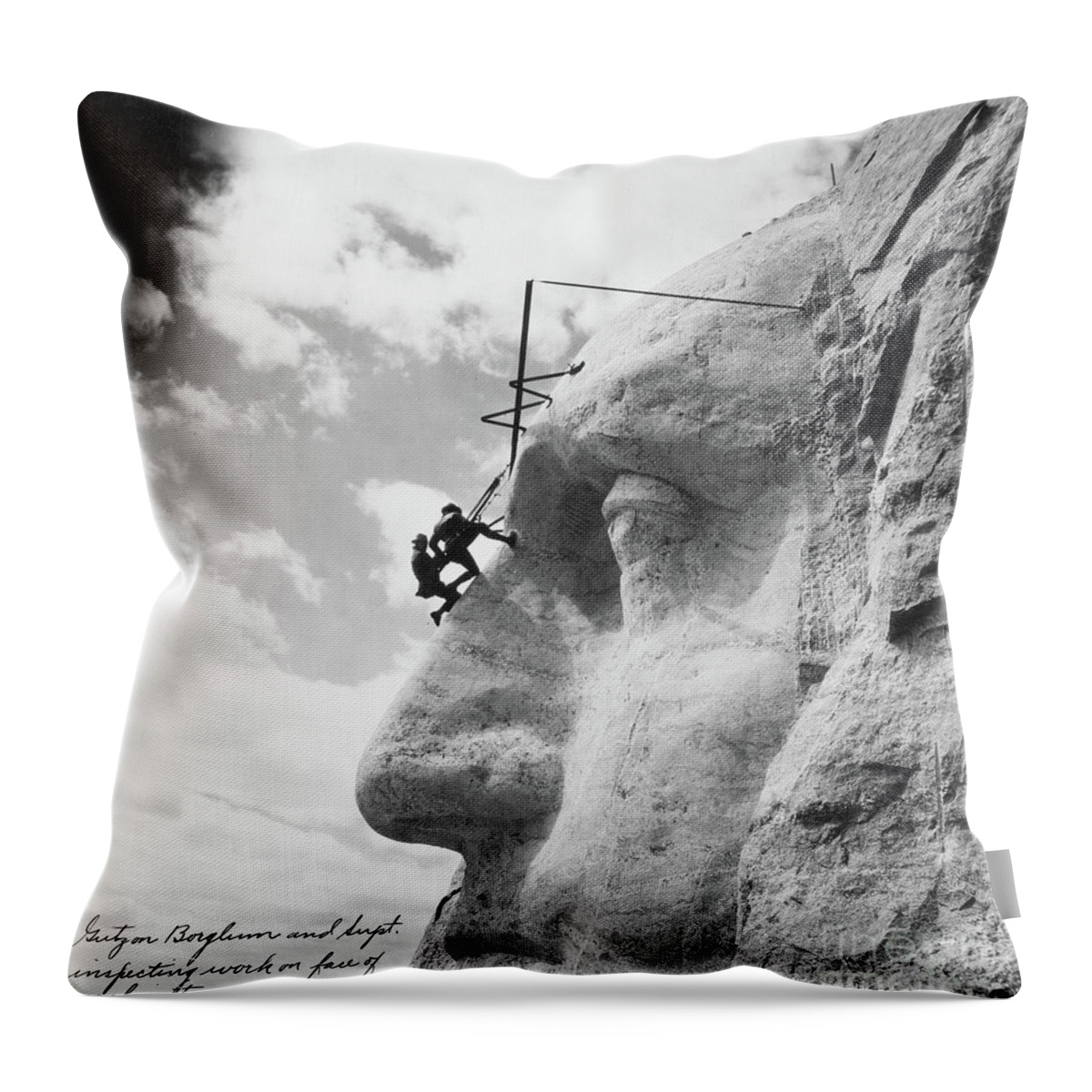 Mount Rushmore Throw Pillow featuring the photograph Gutzon Borglum inspecting work on Washington at Mount Rushmore by American School