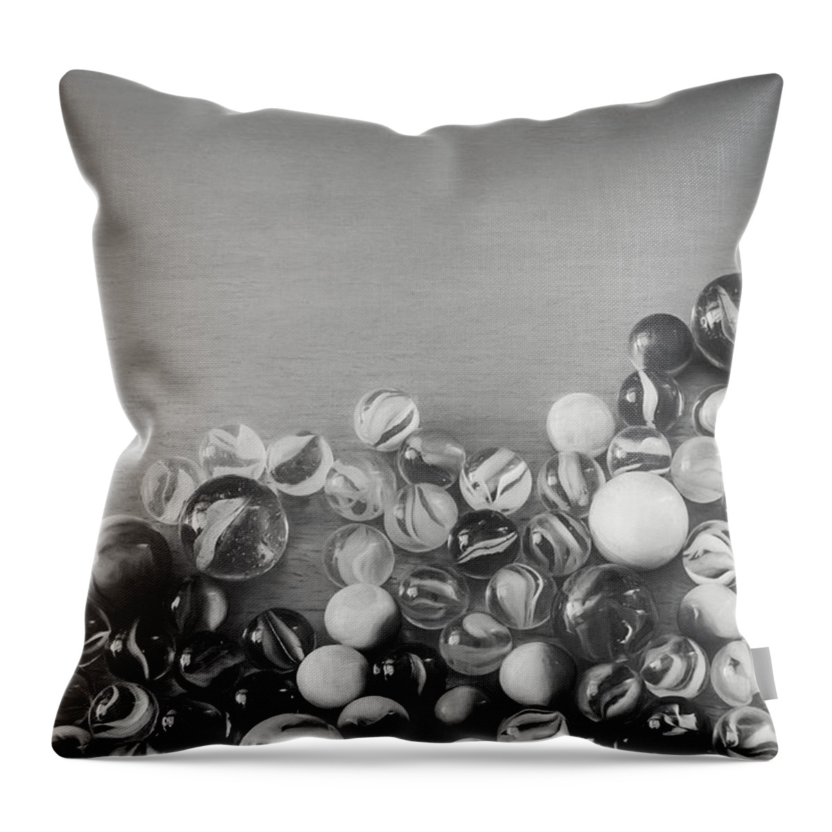 Black And White Throw Pillow featuring the photograph Half My Marbles by Scott Norris