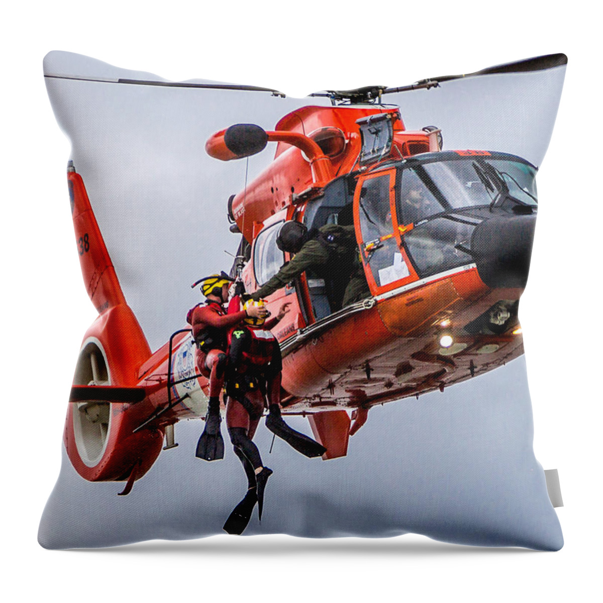 Helicopter Throw Pillow featuring the photograph Hoisting Into Helicopter by Gregory Daley MPSA