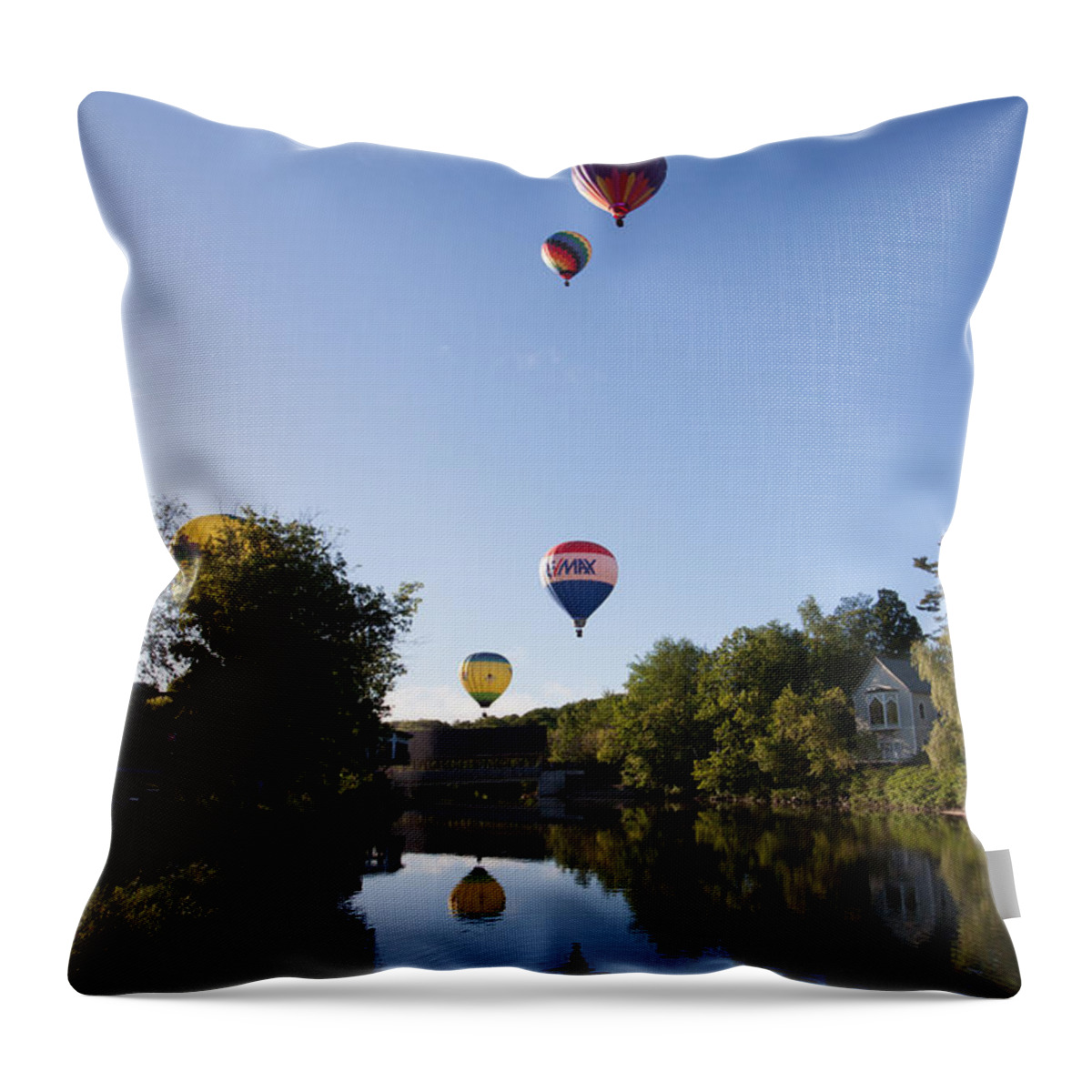 Quechee Covered Bridge Throw Pillow featuring the photograph Hot air balloons playing follow the leader by Jeff Folger