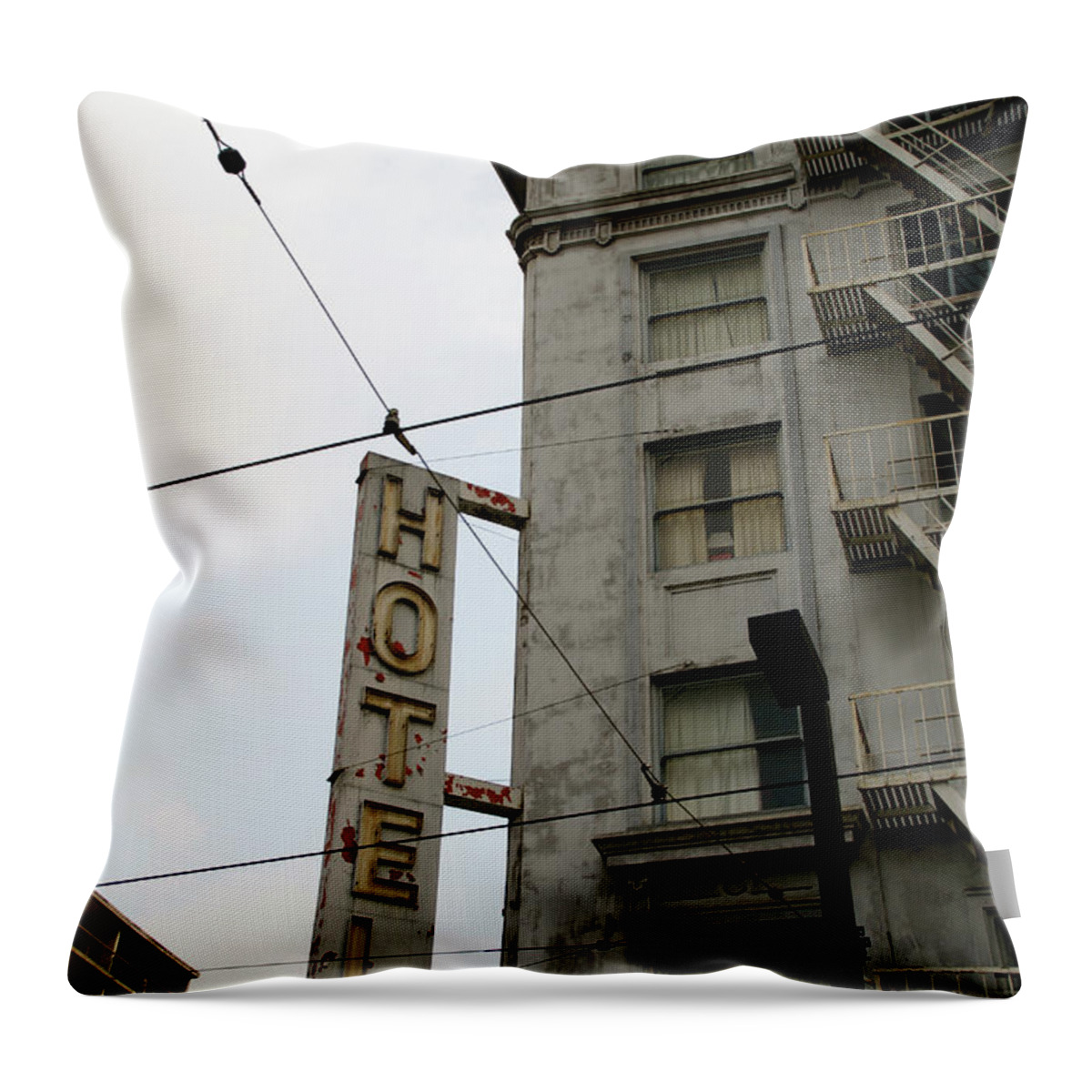 Building Throw Pillow featuring the photograph Hotel by Linda Shafer