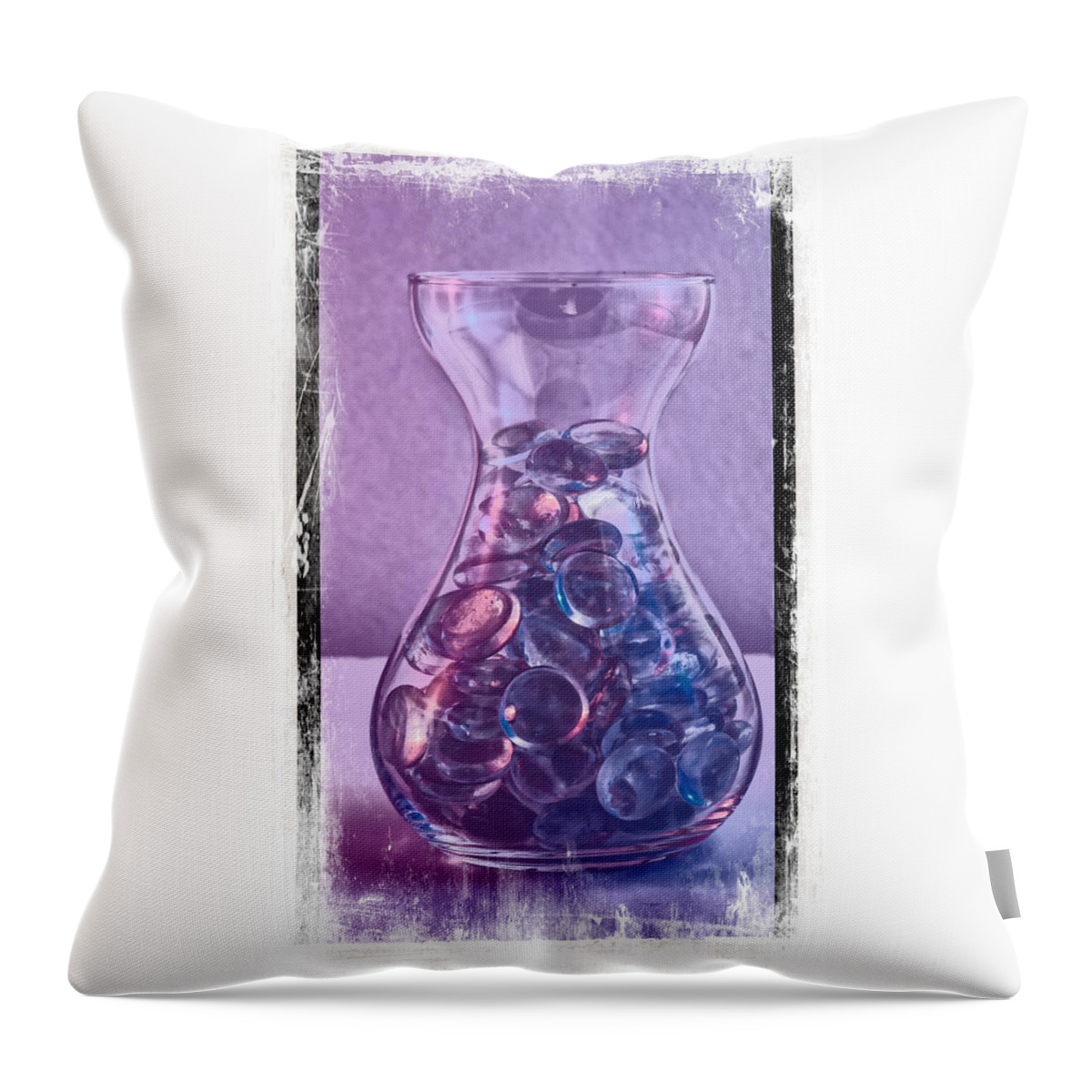 Pebble Throw Pillow featuring the photograph Jar of glass pebbles in hues of blue and purple. by John Paul Cullen
