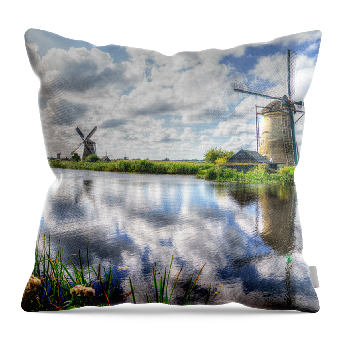 Windmills Throw Pillow featuring the photograph Kinderdijk by Uri Baruch