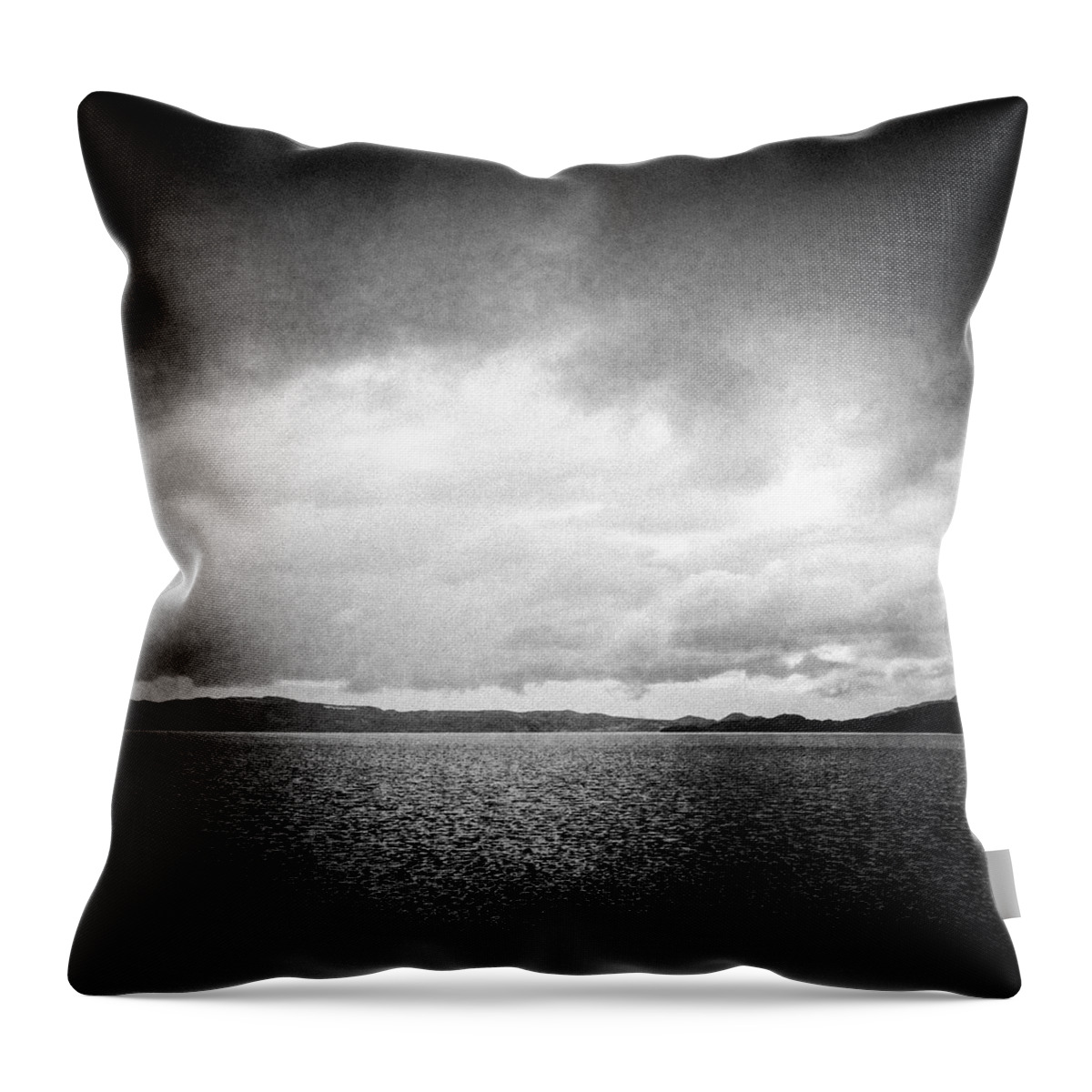 Lake Throw Pillow featuring the photograph Lake and dramatic sky black and white by Matthias Hauser