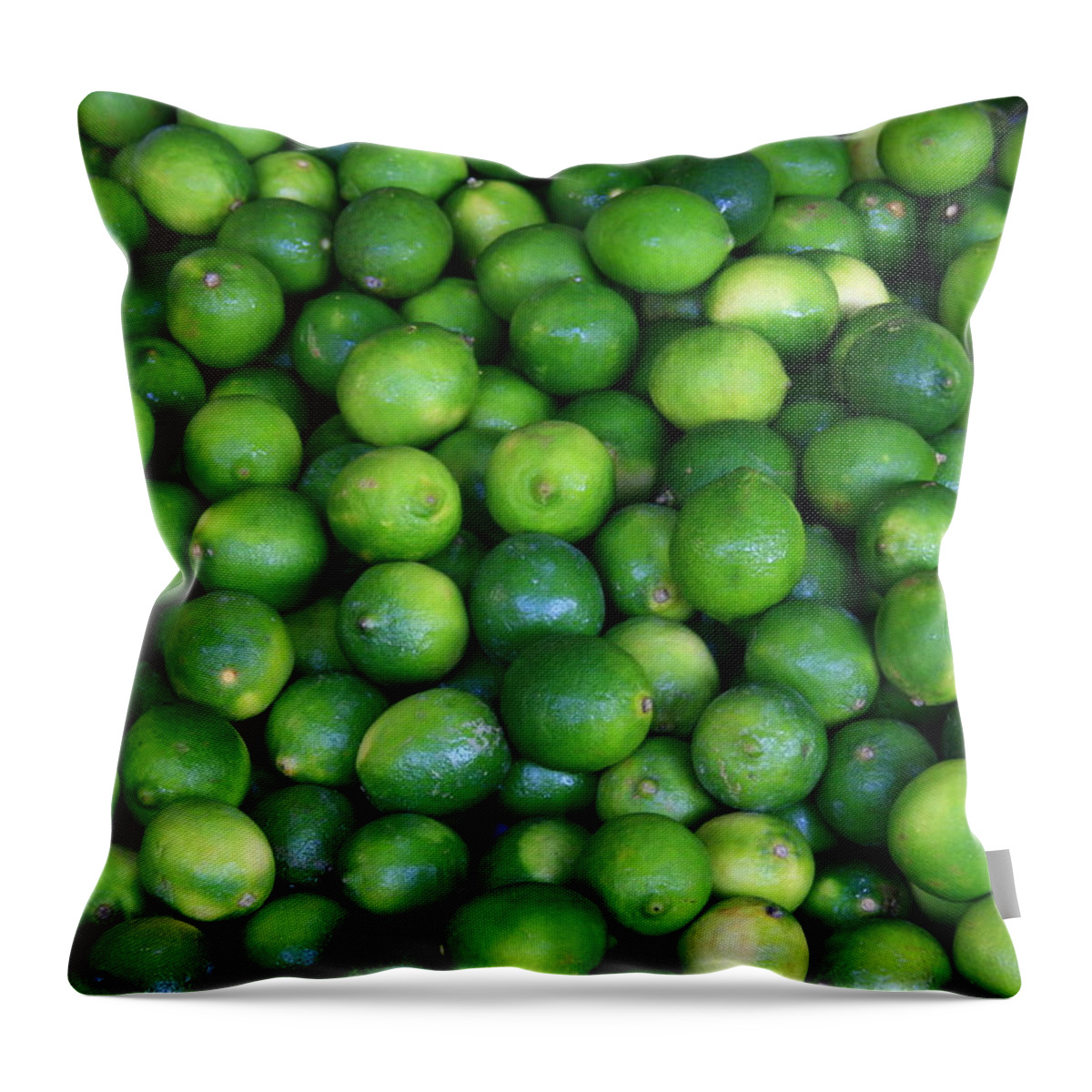 Lime Throw Pillow featuring the photograph Limes by David Dunham