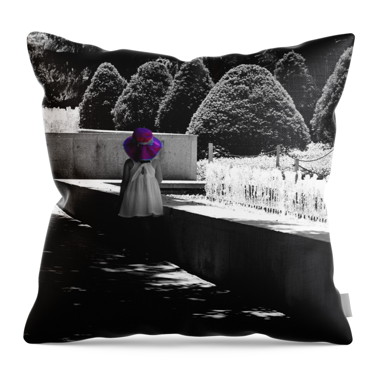 Selective Coloring Throw Pillow featuring the photograph Little Girl in Magenta Hat Black and White Selective Color by Colleen Cornelius