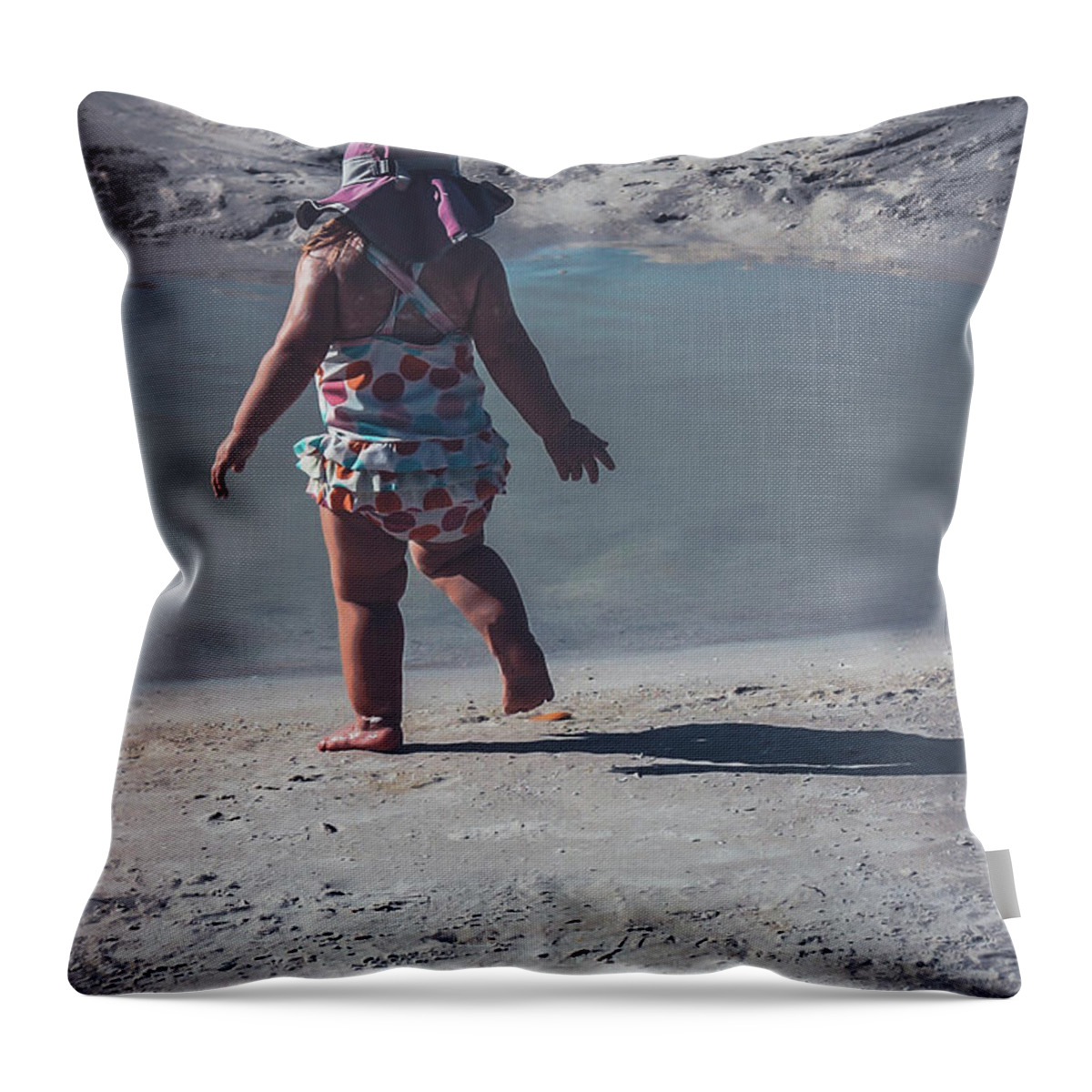 Beach Throw Pillow featuring the photograph Little girl on the beach by Claudia M Photography