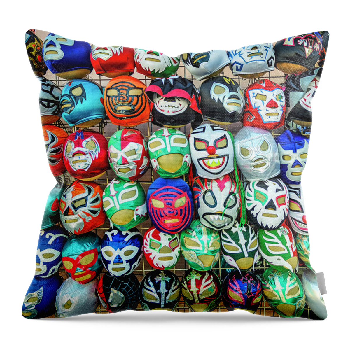 Mask Throw Pillow featuring the photograph Los Luchadores by Tony Crehan