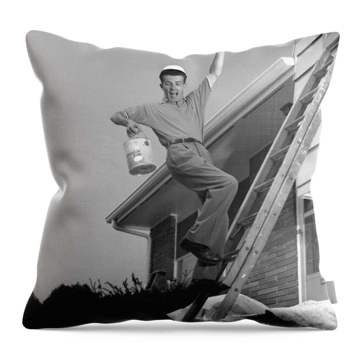 1960s Throw Pillow featuring the photograph Man Falling Off Ladder by H. Armstrong Roberts/ClassicStock