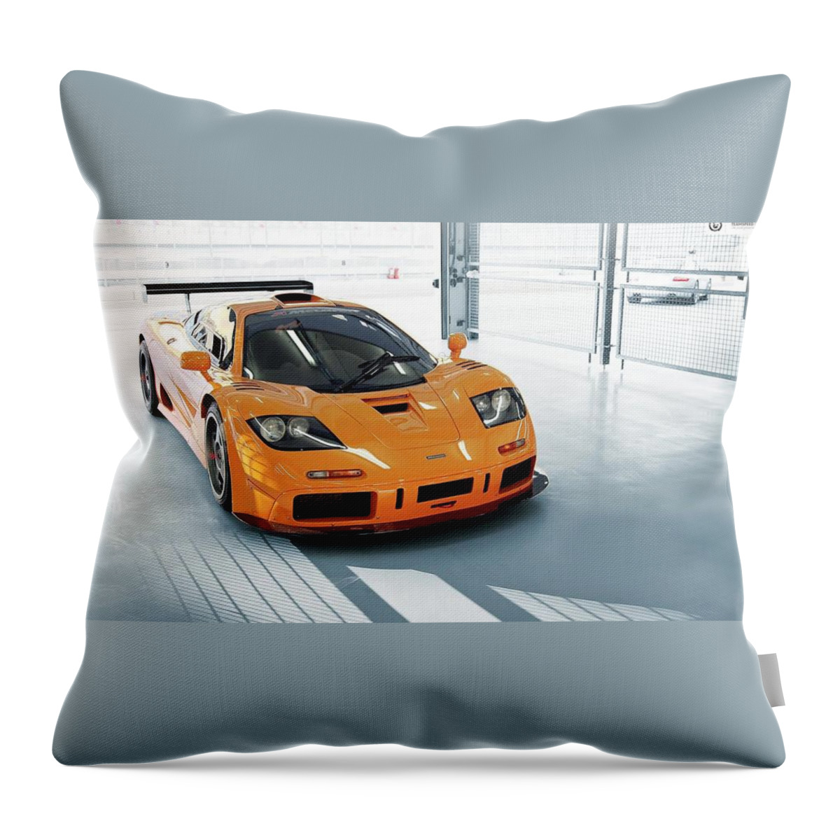 Mclaren F1 Throw Pillow featuring the photograph McLaren F1 by Jackie Russo