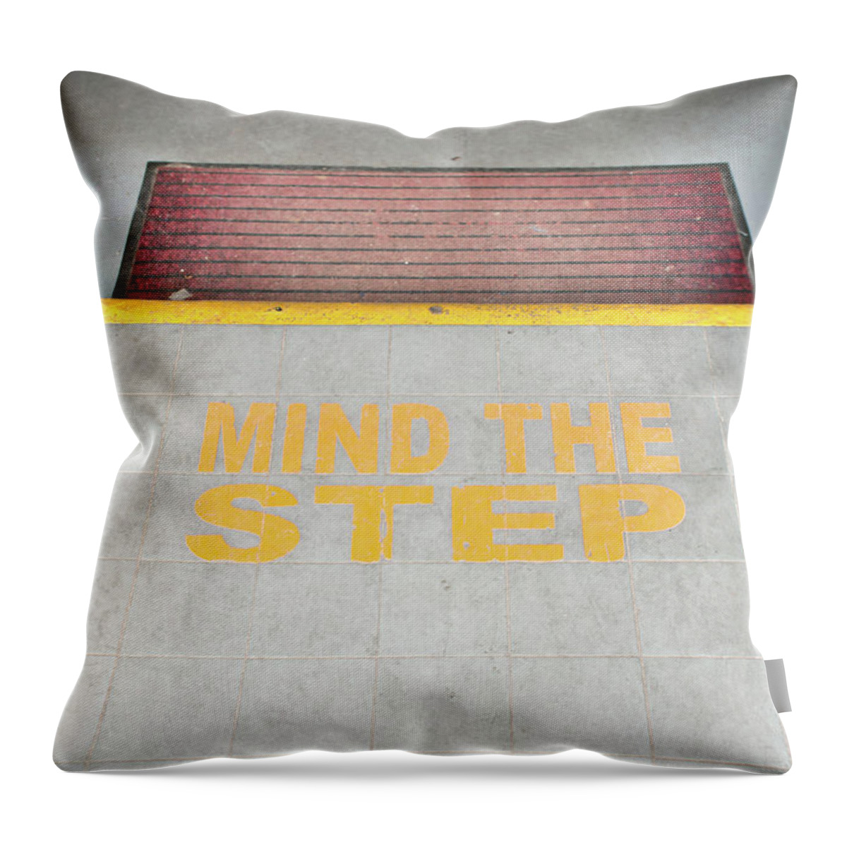 Caution Throw Pillow featuring the photograph Mind the step notice by Tom Gowanlock