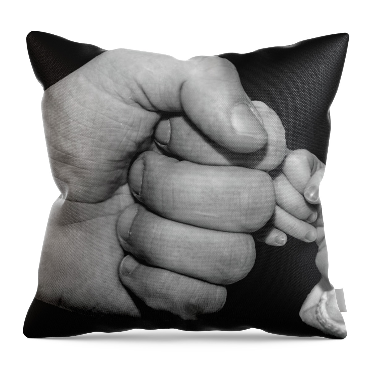 New Born Throw Pillow featuring the photograph New born fist bump by Joe Holley