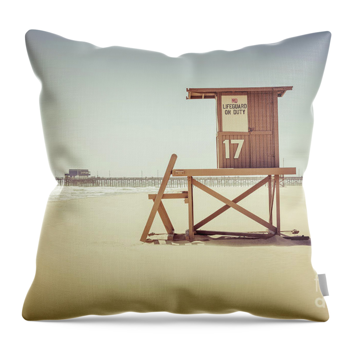 17th Throw Pillow featuring the photograph Newport Beach Pier and Lifeguard Tower 17 by Paul Velgos