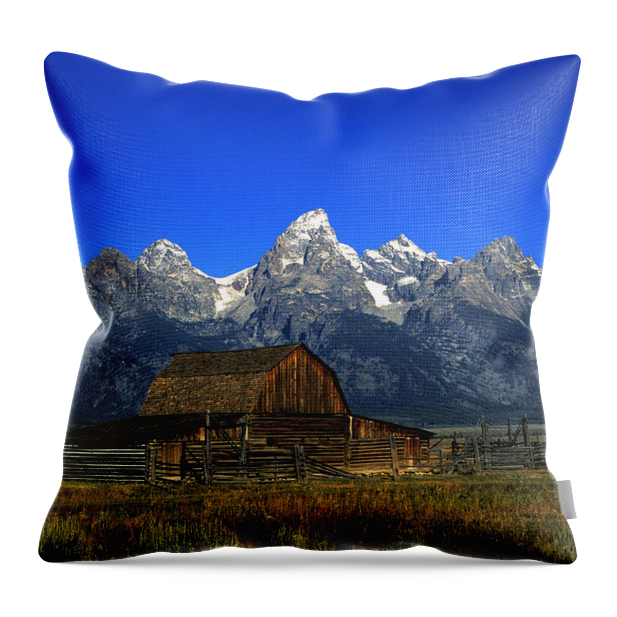 Late Snow Throw Pillow featuring the photograph North Moulton barn Grand Tetons by Gary Langley