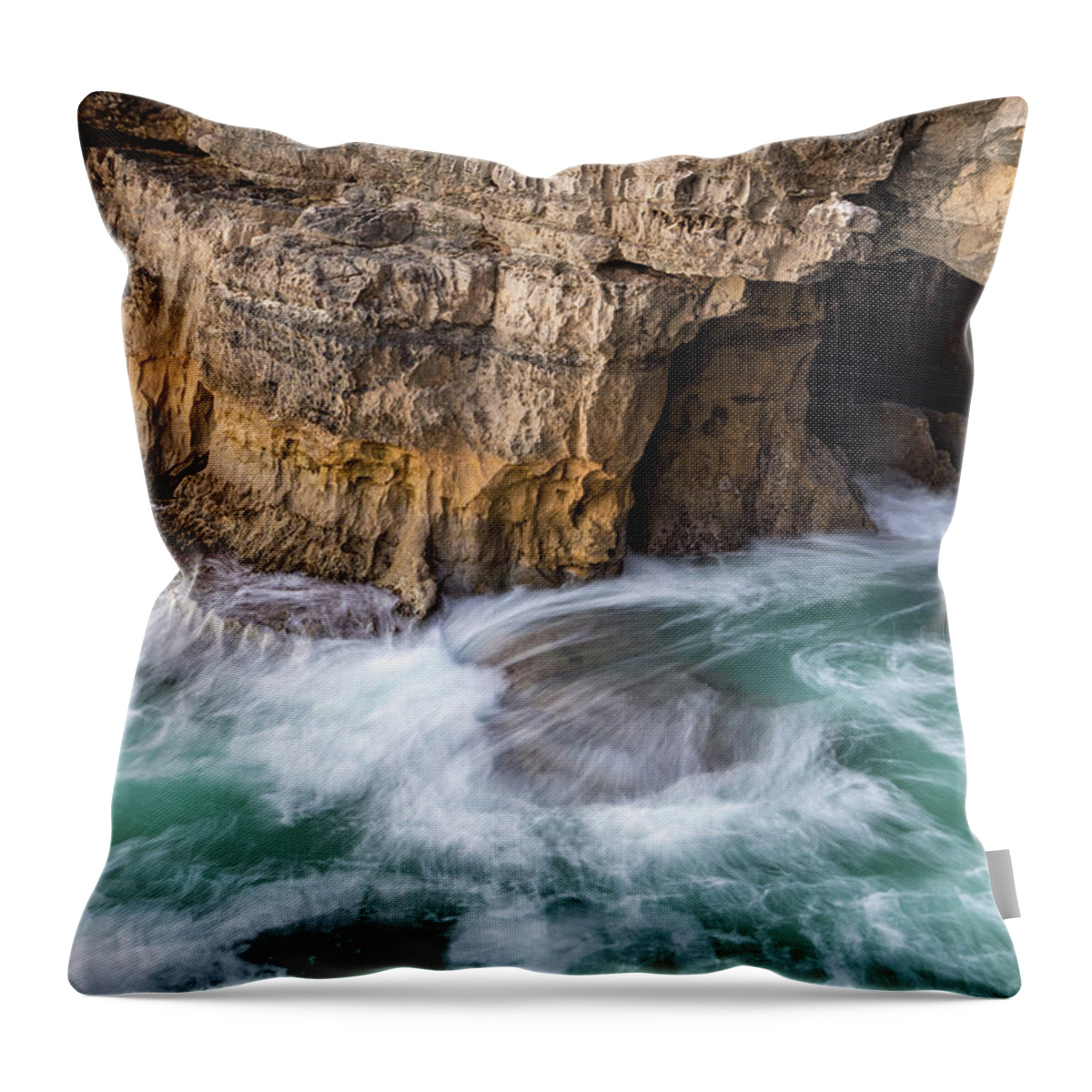 Georgia Mizuleva Throw Pillow featuring the photograph Ocean Muscling into a Cave by Georgia Mizuleva