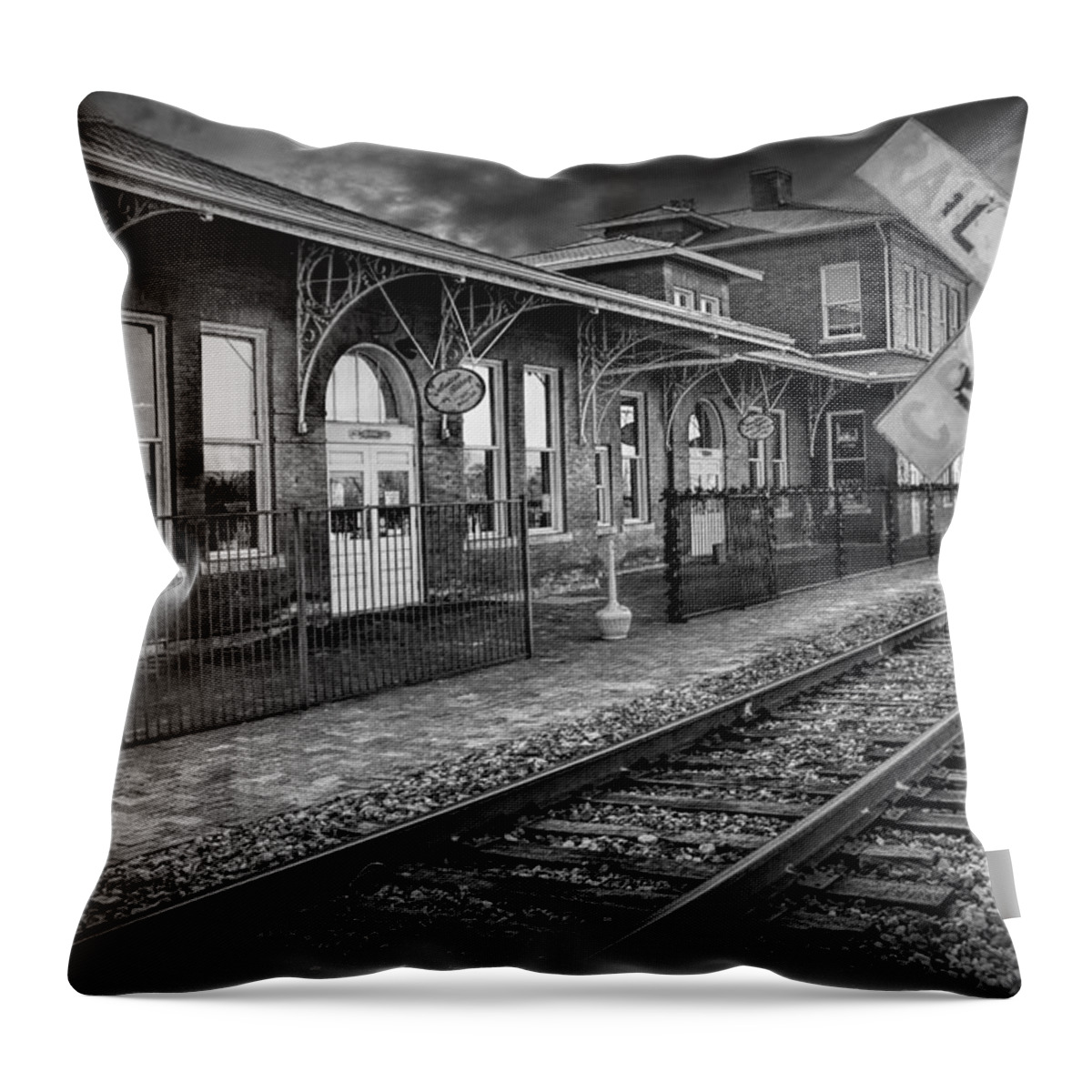Station Throw Pillow featuring the photograph Old Train Station with Crossing Sign in Black and White by Randall Nyhof