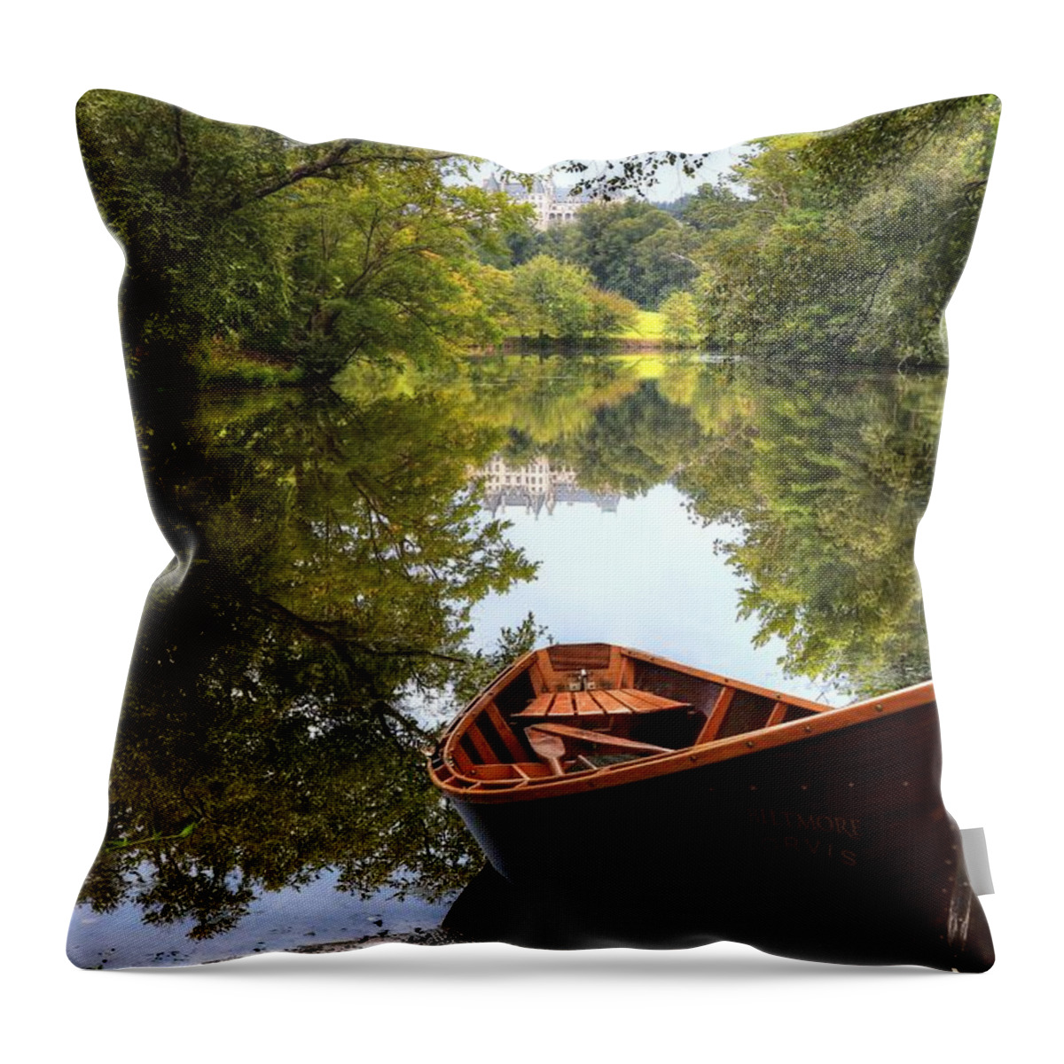 Lagoon Throw Pillow featuring the photograph Orvis Rowboat And Biltmore Reflection II by Carol Montoya