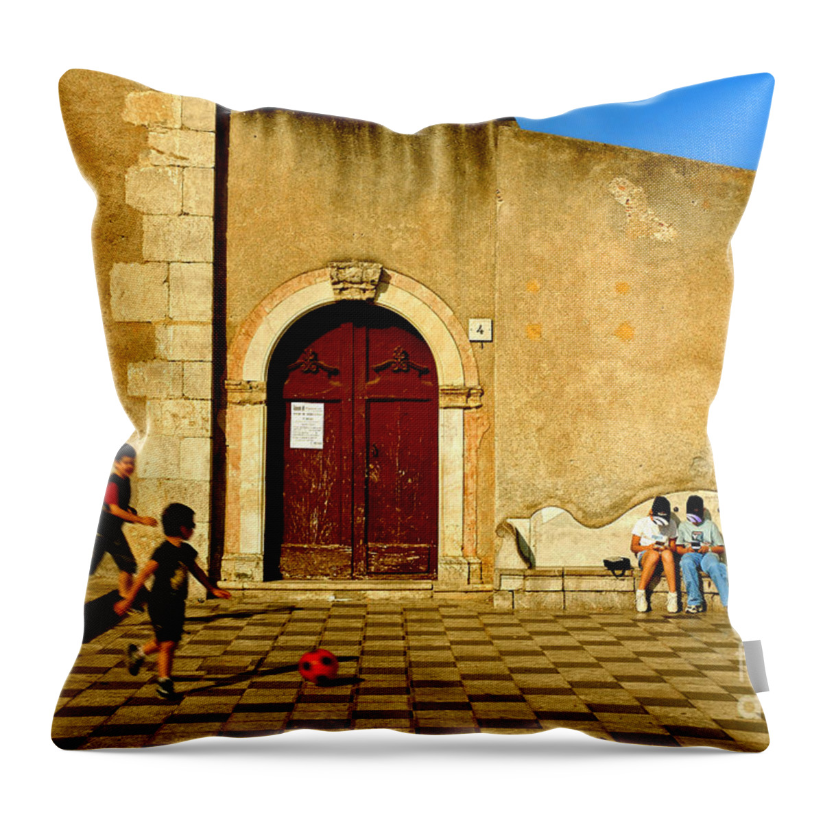 Antique Throw Pillow featuring the photograph Playing in Taormina by Silvia Ganora