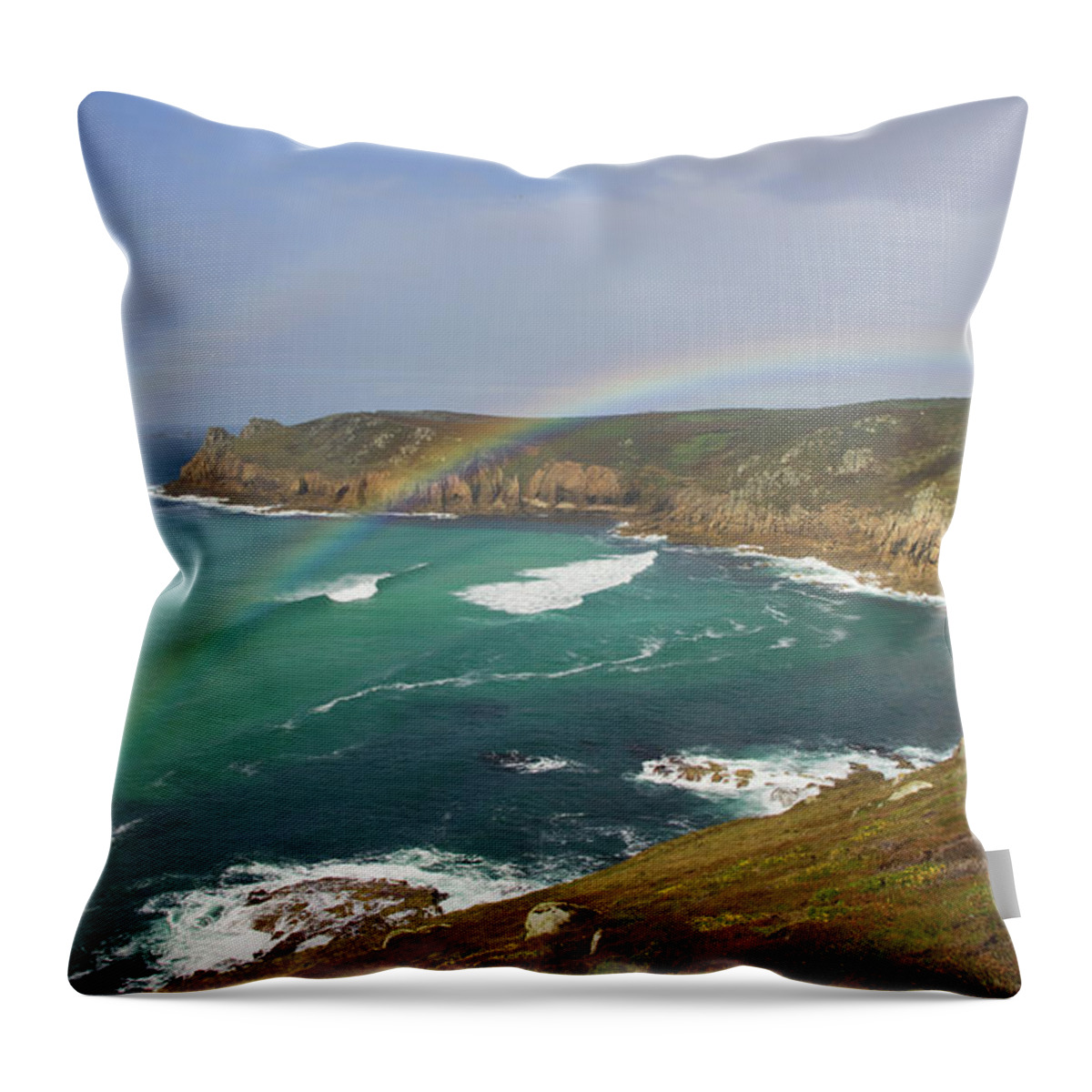 Nanjizal Cornwall Throw Pillow featuring the photograph Rainbow over Nanjizal Bay in Cornwall by Pete Hemington