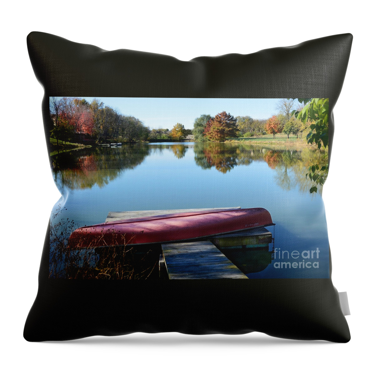 Canoe Throw Pillow featuring the photograph Red Canoe in Autumn by Catherine Sherman