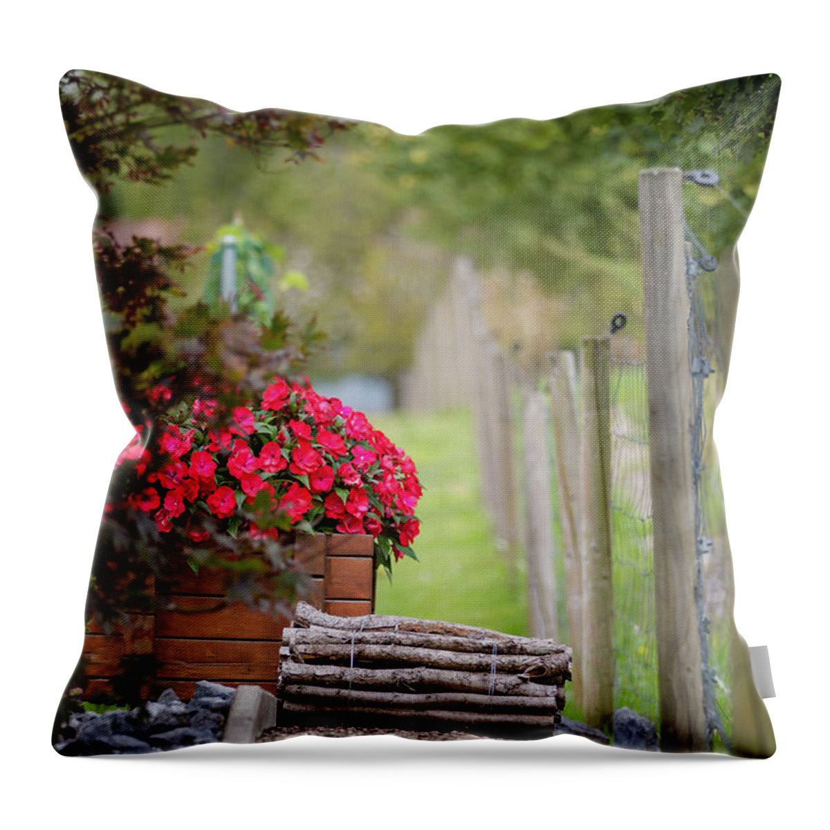 Country Throw Pillow featuring the photograph Red flowerd with Fende and wood billet bundle by Amanda Mohler
