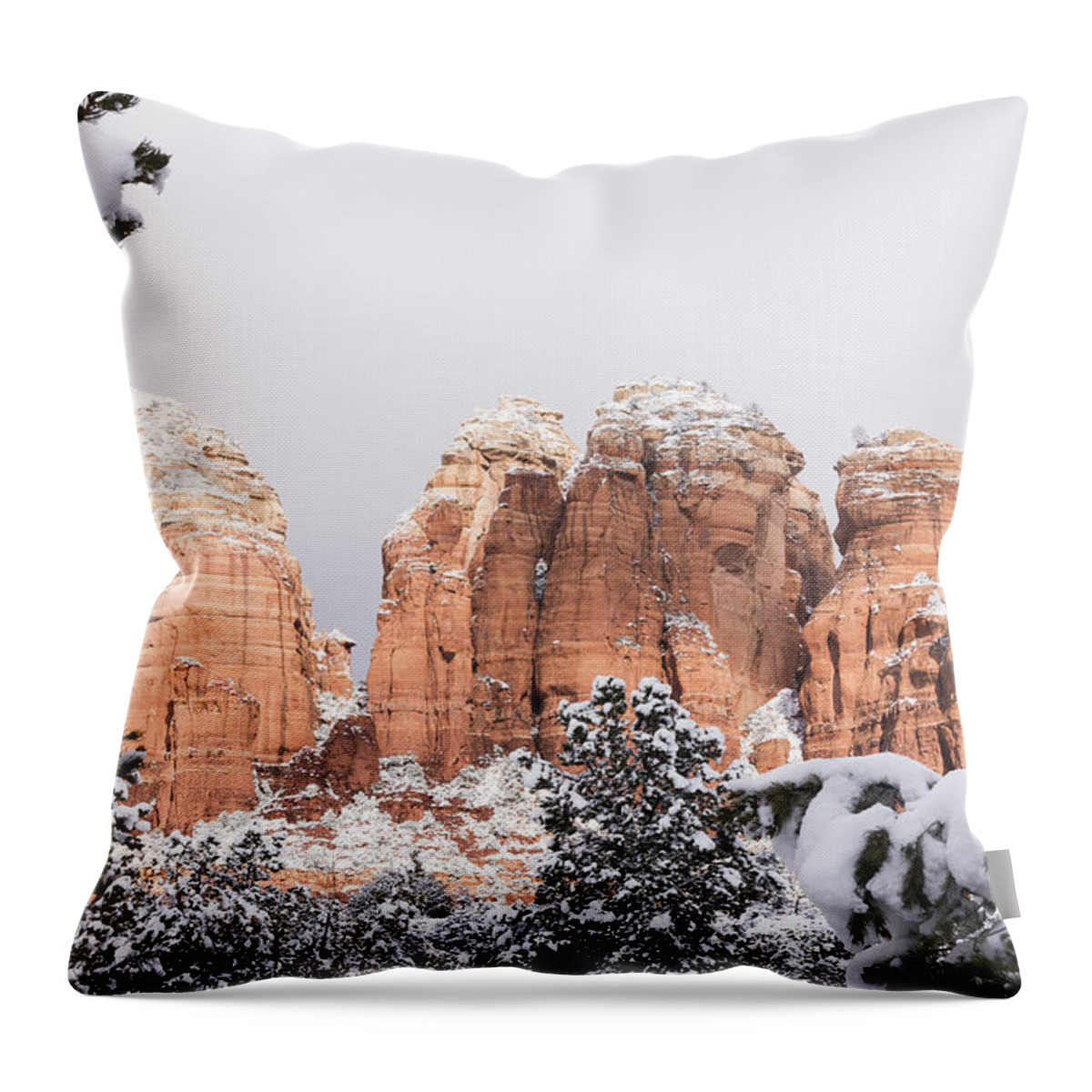 Sedona Throw Pillow featuring the photograph Red Towers under Snow by Laura Pratt