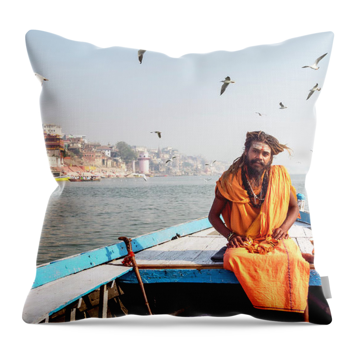 Asia Throw Pillow featuring the photograph Sadhu in a boat. by Usha Peddamatham