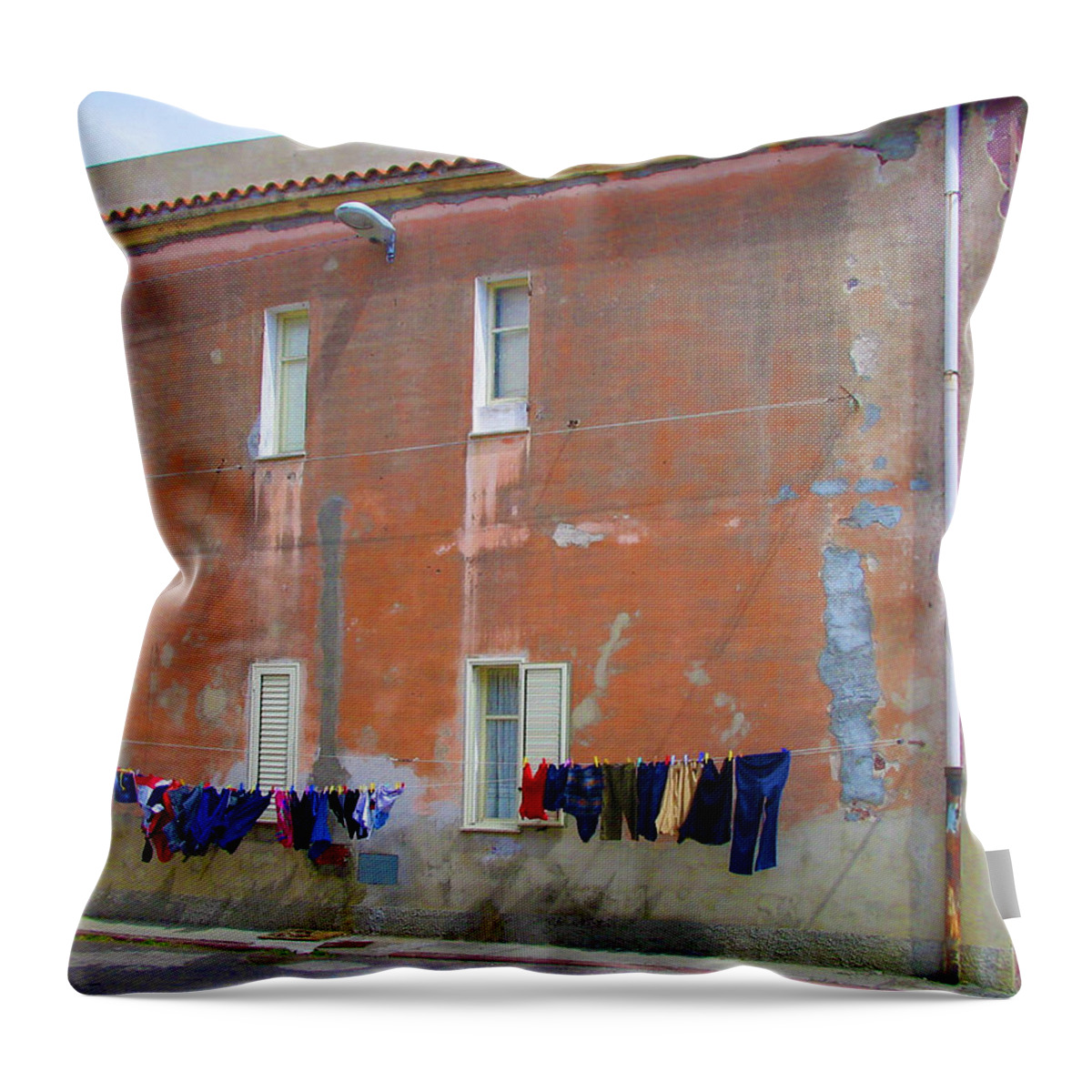 Red Building Throw Pillow featuring the photograph Sardinian Laundry by Jessica Levant