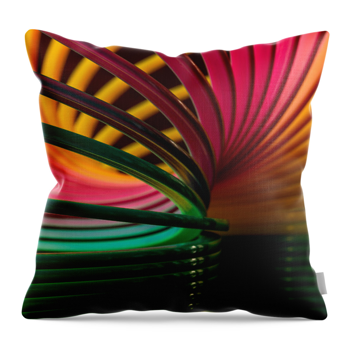Toy Throw Pillow featuring the photograph Slinky III by Bob Cournoyer