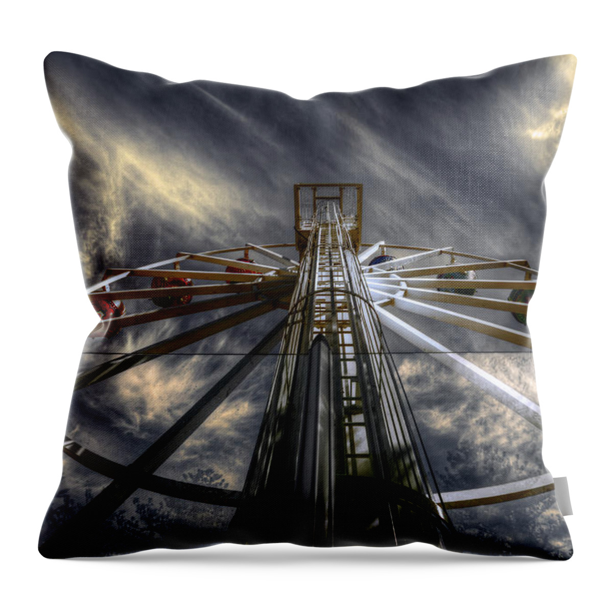 Amusement Throw Pillow featuring the photograph Spinner by Wayne Sherriff