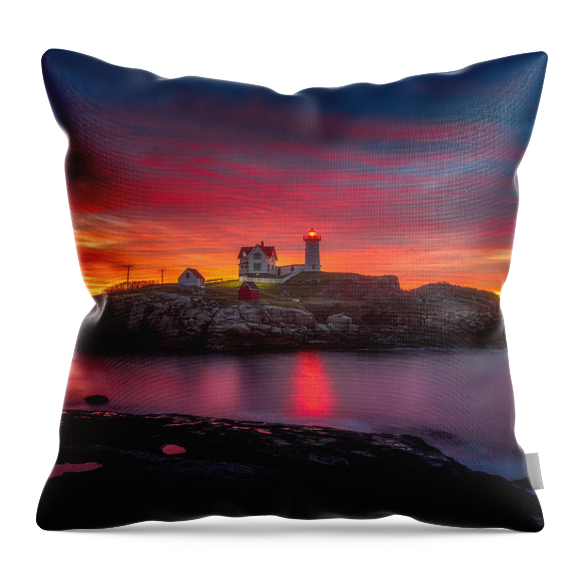 Sunrise Throw Pillow featuring the photograph Sunrise over Nubble Light by Darren White