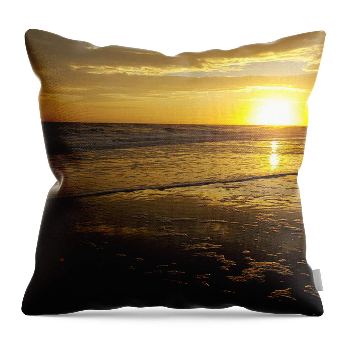Sunset Throw Pillow featuring the photograph Sunset over the beach by Ami Brown