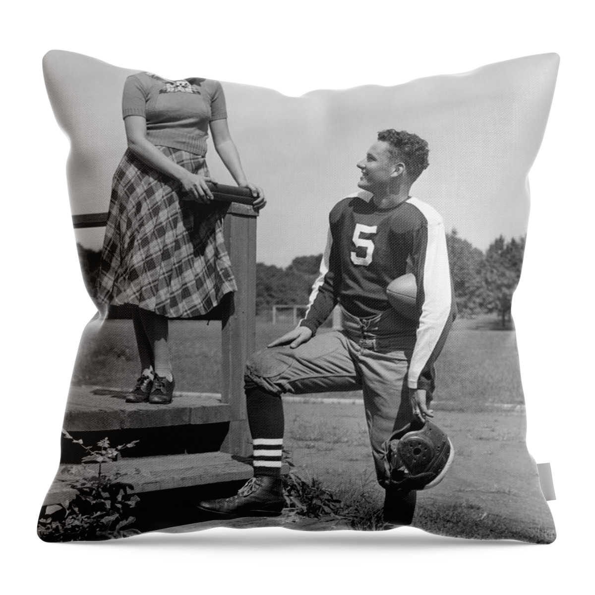 1930s Throw Pillow featuring the photograph Teenage Flirtation, C.1930-40s by H. Armstrong Roberts/ClassicStock